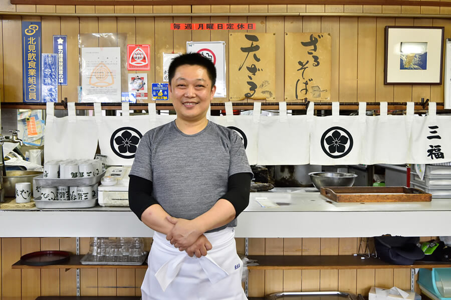 店主の村越光さん